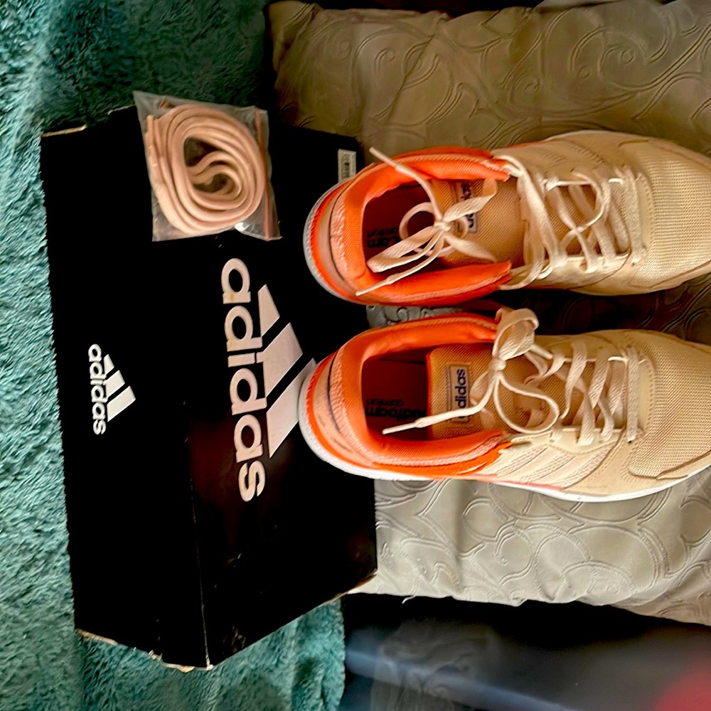 Adidas size10 ladies with free shoe lace and white shoe